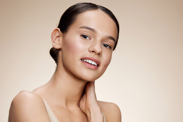 Young woman with smooth skin and natural makeup, showcasing beauty and confidence Ideal for skincare, wellness, and beauty campaigns