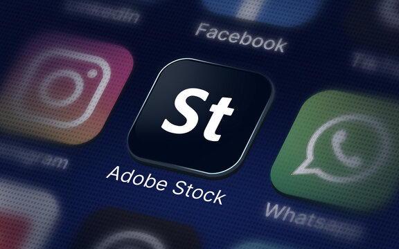 Adobe stock logo on the digital screen