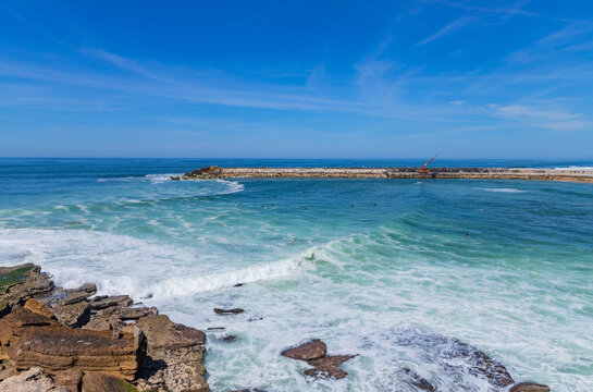 Surfers on the Praia dos Pescadores