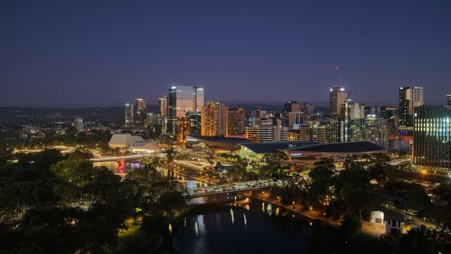 Adelaide City, South Australia &ndash; Aerial Drone View of Night Skyline, Riverbank Precinct, Festival Lights, Urban Cityscape Along River Torrens
