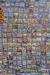 Colorful Portuguese Azulejos and Lisbon Souvenir Magnets on Display