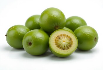 Obraz premium Fresh and vibrant kiwi berries arranged on a pristine white background, showcasing their unique texture. amla fruit
