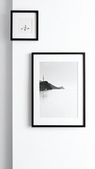 Framed art on wall tower by water, plus abstract design