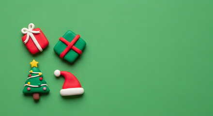 クリスマスのツリーとプレゼントとサンタ帽子のかわいいクレイアート背景