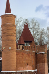 Historic Brick Tower and Castle Wall in Winter, Architecture
