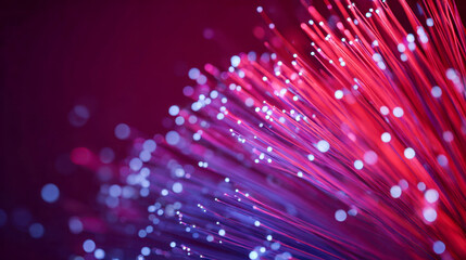 Vibrant abstract fiber optic light strands glowing with purple and pink hues against a dark background creating a dynamic futuristic digital network effect