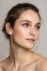 Ultra realistic studio portrait photo of a young adult white woman, natural skin texture.