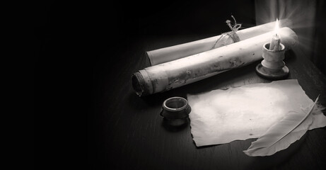 Paper and quill on the table