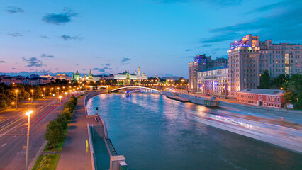 Fototapeta premium View from the Patriarchal Bridge towards the Moscow Kremlin and the Large Stone Bridge day to night timelapse.
