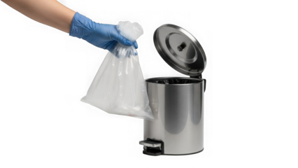 hand in blue glove putting trash bag into metal bin
