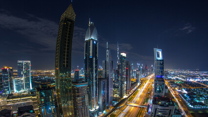 Dubai downtown architecture day to night timelapse. Top view over Sheikh Zayed road with...