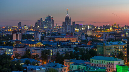 Fototapeta premium Skyscrapers day to night timelapse, Kremlin towers and churches, stalin houses in Moscow, Russia