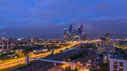 Fototapeta premium Business complex of skyscrapers Moscow city day to night timelapse.