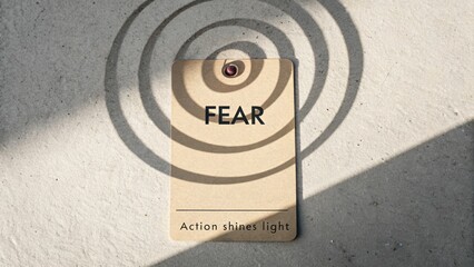 A Fear Tag With Spiral Shadow and Action Shines Light Text