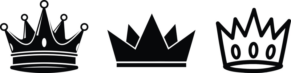 Fototapeta premium Three black crown silhouettes on a white background