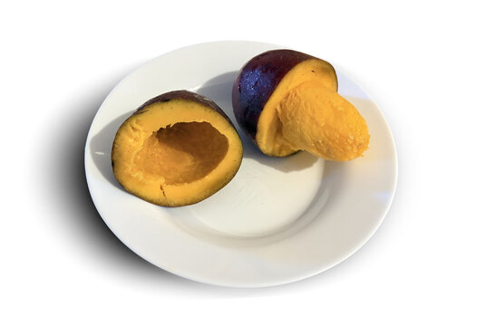 Ripe abiu fruit showing sweet juicy pulp on plate