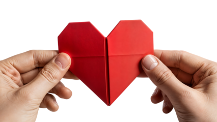 Hands holding red origami heart