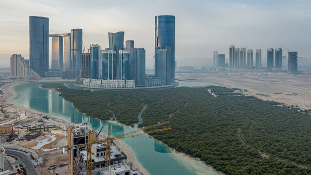 Buildings on Al Reem island in Abu Dhabi timelapse from above.