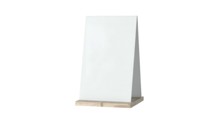 Angled, white blank signage stands on a wooden base with a black background