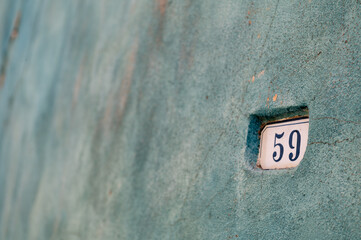 At number 59, on the street of the tourist city of Baso, Sardinia, Italy, October 2025.