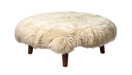 Circular, fur-covered ottoman with dark wooden legs, set against a black background