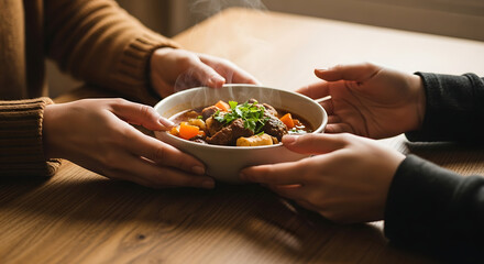 Hands Pass Bowl of Steaming Stew with Vegetables on Wooden Table