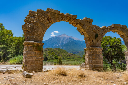 Tahtalı Mountain seen through ancient gate in Phaselis, Turkey