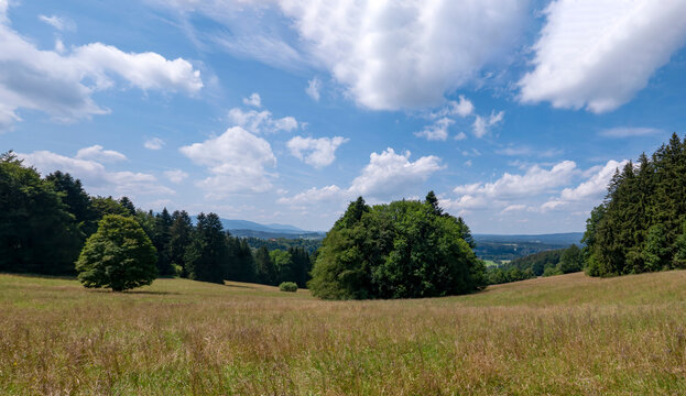 Beautiful pre-Alpine landscape with blue skies in the district of Miesbach in Bavaria.
