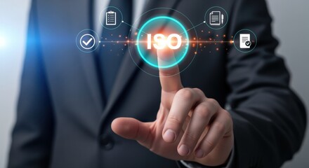 Fototapeta premium Businessman touching ISO icon, symbolizing International Standards Organization certification, compliance, and quality management with documentation checklist