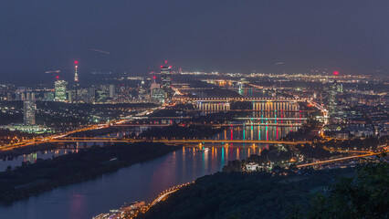 Skyline of Vienna from Danube Viewpoint Leopoldsberg aerial day to night timelapse.