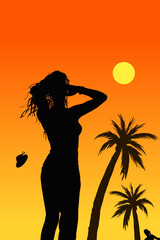 silhouette of a woman on the beach at sunset