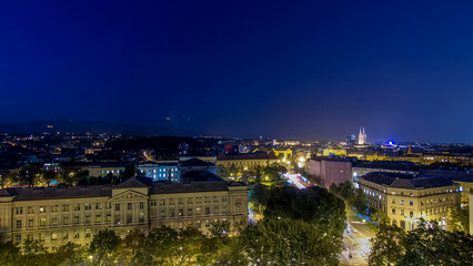 Panorama of the city center day to night timelapse with intersection in front of national theater and museum in Zagreb, Croatia.