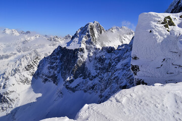 View of High Tatras from the summit of Rysy mountain in winter, High Tatras, Poland, Slovakia
