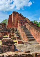 Nalanda University ruins in Bihar reveal a vast ancient learning center, founded in the 5th century CE, famed for monasteries, libraries, and global Buddhist scholars.