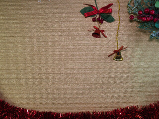 Christmas Decorations Golden Background - Festive Christmas decorations frame a shimmering gold background with ample copy space. Perfect for holiday greetings, sales, and seasonal designs.