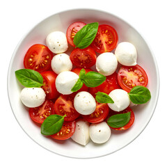 Fresh caprese salad with halved tomatoes, mozzarella balls, and basil leaves in a bowl