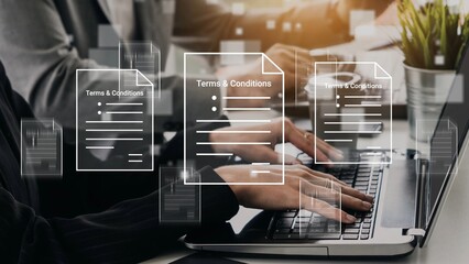 Business Professional Working on Laptop with Digital Overlay of Terms and Conditions for Legal Documentation and Compliance in Modern Office Environment Gluon.