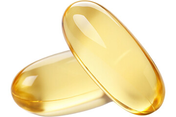 Golden capsules on black background for health and wellness