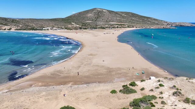 Aerial drone cineamatic video of paradise two sided beach of Prasonisi ideal for wind and kite surfing in Southeast part of Rhodes island, Dodecanese, Greece