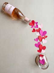 Heart Shaped Confetti and Wine Bottle