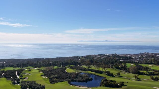 Aerial footage along the coastline at the Pelican Hill Resort in Newport Beach California USA