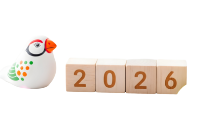 Decorative bird figurine beside 2026 blocks