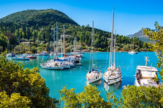 Sailing boats anchoring in idyllic sea bay near Geni village, Lefkada island, Greece