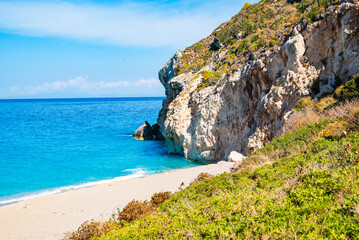 View of blue sea and cliff rock on Milos beach, Lefkada island, Greece