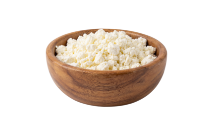 Fresh dairy cottage cheese curds served neatly inside a rustic wooden bowl on transparent background