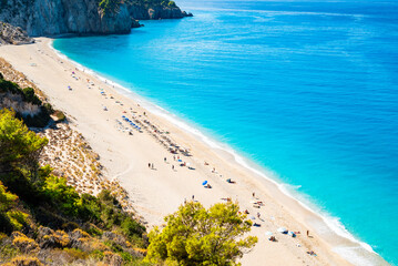 View of sandy Milos beach and crystal clear turquoise sea, Lefkada island, Greece