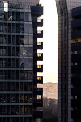 Obraz premium Tall, residential skyscrapers and sunset, aerial view.