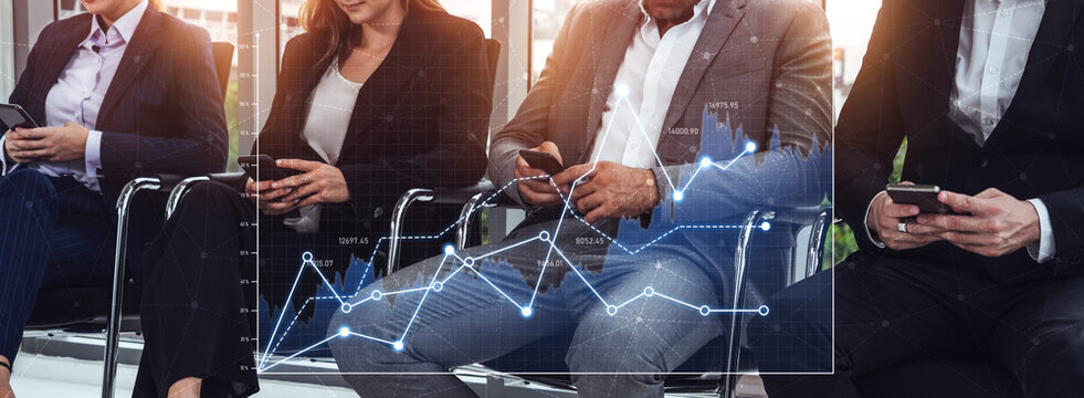 Business professionals interact with smartphones while reviewing financial charts in a contemporary office, showcasing collaboration and modern technology in a vibrant setting. Scalp - Powered by Adobe