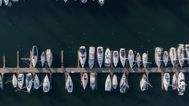 Boats on a pier in Vejle Fjord in Denmark. 