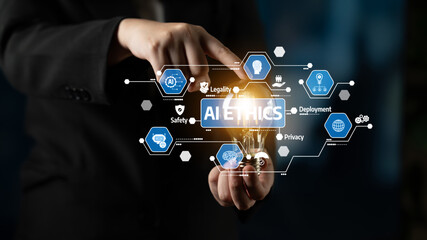 A business professional gestures towards a conceptual graphic featuring AI ethics and related...
